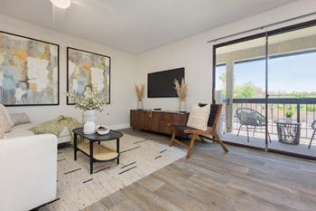 Wide-hardwood style flooring throughout living areas
